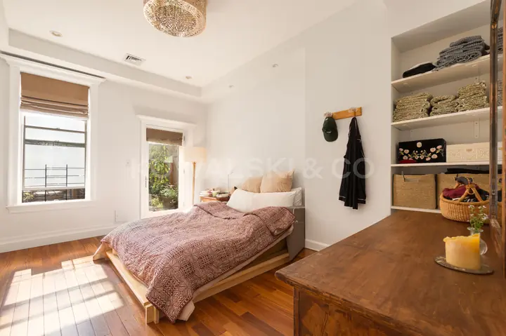 Bedroom, looking toward the window and garden door