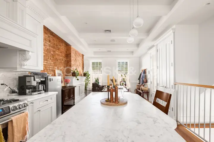 Kitchen, looking along the island toward the living room